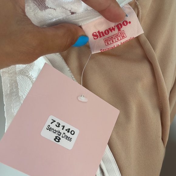 Brand new with tags white lace bridal dress. Beautiful details and strapless - Picture 3 of 6